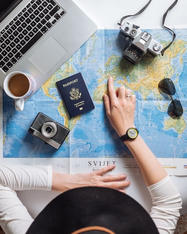 traveler looking at laptop planning next trip
